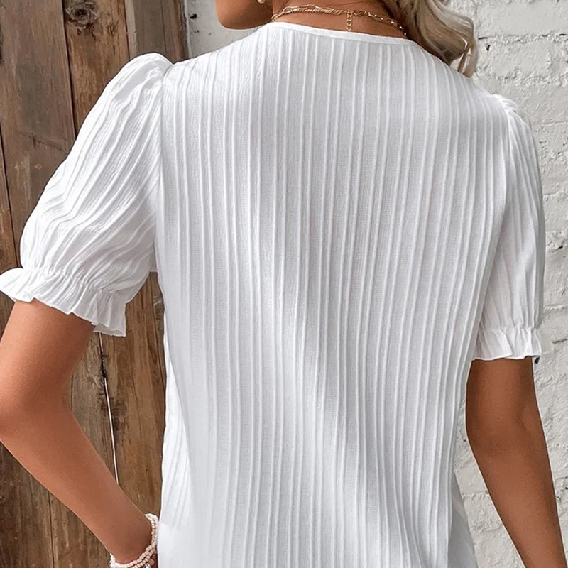 Chemise élégante en dentelle unie à col en V